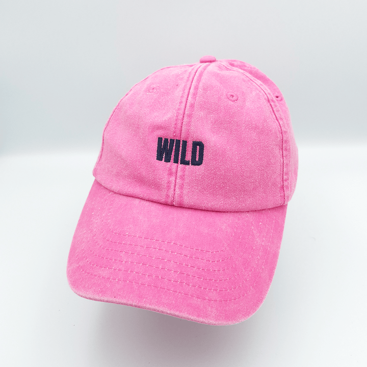 Wild embroidered baseball cap in pink with navy embroidery, by Black &amp; Beech