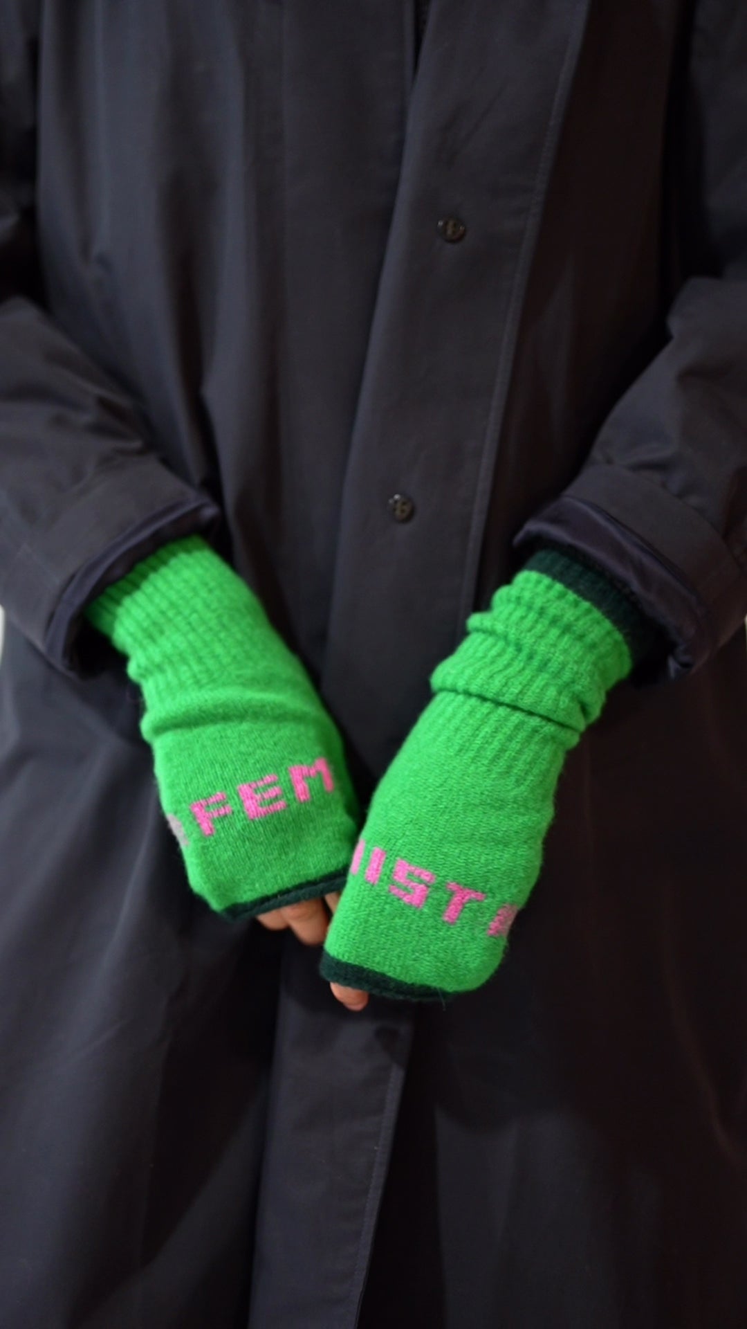Do No Harm Take No Shit Wrist Warmers in Fluro Pink
